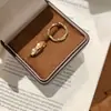 Pendientes de Aro Mobius Minimalistas 2026 Nuevos Populares Diseño de Nicho Pinzas para Orejas para Mujer Verano Accesorios Simples para Orejas
