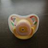 Nuevo tamaño código de tamaño molares juguete para morder con cubierta antipolvo fabricantes de chupetes de silicona para bebés en stock lote