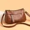 Bolso de hombro de moda estilo coreano 2026 para mujeres de mediana edad, simple y moderno, un bolso de mano elegante para mamás