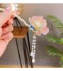 Horquilla retro exquisita con forma de U y diseño de flor de peonía, nueva horquilla china de súper hada, tocado antiguo de alta gama para cheongsam y hanfu para mujer.