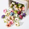 Flor de brote de té simulación transfronteriza flor de brote de hoja retro cabeza de flor de brote corsage tocado flor decorativa pequeños accesorios de camelia
