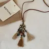 Nuevo collar de plumas de bronce zen chino para mujer, estilo étnico bohemio, cadena de suéter larga de doble capa, accesorios