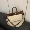 Bolsa de Mão Retrô Simples Transfronteiriça Bolsa para o Dia a Dia para Mulheres 2025 Nova Bolsa Tote de Lona Versátil Bolsa de Ombro Transversal