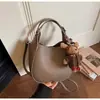 Bolsa Pequena Coreana Retro Transfronteiriça para Mulheres Nova Moda Primavera 2026 Versátil Bolsa Transversal Super Popular Bolsa de Mão Estilo Balde