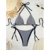 Traje de baño de dos piezas a rayas con cuello halter, estilo nuevo 2026, marca independiente para mujer, bikini sexy de amarre para playa y aguas termales