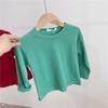 2022 otoño e invierno camiseta de algodón para niños de cuello redondo manga larga color sólido niños y niñas bebé camiseta base niñas primavera y otoño