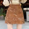 Saia curta de camurça de alta qualidade com bordado jacquard estilo francês, nova cintura alta modeladora anti-exposição A13436-1