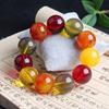 Pulsera de Cera de Abeja Ámbar de Segunda Generación Venta al por Mayor de Fábrica Ámbar Sangre Ámbar Flor Ámbar Medicina Pulsera de Cera Vieja Fluorescente Flotante Agua Salada