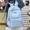 Mochila escolar estilo coreano nueva para niñas, gran capacidad, casual y ligera, fresca y dulce, adecuada para viajes de secundaria y preparatoria