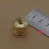 Una variedad de accesorios de juguete para manualidades con cabeza colgante de plata y oro galvanizado, material de bricolaje con cuerda para colgar la cabeza de 1 a 3 cm