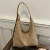 Bolsa de Mão Feminina Estilo Hong Kong Moda 2025 Nova Bolsa de Ombro Retrô Texturizada Verão Bolsa Tote Balde para Deslocamento
