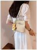 Bolsa balde elegante e estilosa com padrão de lichia, bolsa versátil para mães e filhas no dia a dia, nova bolsa de ombro e transversal super popular