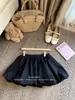 Saia Curta Meia-Calça Xadrez Florido de Verão Feminina Petite Moda Casual Cintura Alta Evasê Menina Quente Antiexposição Fofa