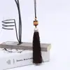 Venta al por mayor de fábrica 15 colores borla de jade hecha a mano pequeño colgante oreja textil para el hogar banderín de mesa borla cortina de oreja accesorios