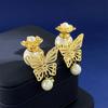 Pendientes de mariposa huecos exquisitos de moda, de perlas de lujo ligero, estilo frío, diseño personalizado, pendientes de cuentas grandes y pequeñas para mujer