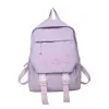 Mochila escolar fresca de estilo coreano para niñas, estudiantes de secundaria, linda mochila pequeña y extrovertida, mochila de viaje ligera para estudiantes de secundaria.