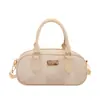 Bolso de mano simple a cuadros, nuevo modelo 2026, bolso tipo bowling de moda de nicho texturizado, bolso versátil con almohadilla para el hombro