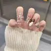 Uñas Portátiles de Alta Gama para Año Nuevo: Rojo Retro Cisne Puntos, Ojo de Gato Francés, Moño, Brillo Deslumbrante, Manicura Hecha a Mano que Realza el Cutis