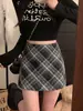Falda de lana a cuadros para mujer, nuevo estilo otoño/invierno, retro y elegante, de cintura alta, falda de línea A adelgazante, falda ajustada, falda corta a cuadros
