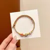 Pulsera de Hilo Rojo de Bebé de Dibujos Animados 2026 Nuevo Estilo Bendición Pequeño Zongzi Pulsera Estilo Chino Festival del Bote del Dragón Hilo de Cinco Colores Ajustable Venta al por Mayor