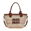 Nova bolsa de mão elegante de alta qualidade 2026, bolsa de palha da moda, bolsa de balde, bolsa de ombro premium, bolsa transversal para férias, atacado