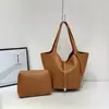Bolsa de ombro casual com padrão de lichia para mulheres, nova moda 2025 para o dia a dia, bolsa de mão de grande capacidade, bolsa de ombro, bolsa de axila