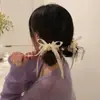 Goma para el pelo con lazo de cinta para mujer, con sensación de alta gama, Banda elástica de cinta estilo Ins, Accesorio para coleta anudada de satén en blanco y negro