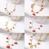 Collar Cruzado Transfronterizo Europeo y Americano para Mujer Estrella de Cristal Estrella de Mar Concha Colgante Perla Cadena de Cereza Multi-Colgante Collar Corto