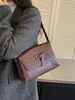 Bolsa de ombro de alta qualidade e estilosa, nova coleção 2026, bolsa transversal versátil, item de nicho e popular para o mercado internacional, bolsa de ombro quadrada pequena para mulheres
