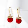 Pendientes de perla de concha color champán para otoño e invierno, temperamento femenino, socialité, estilo Hong Kong, estilo Hepburn, pendientes retro, adornos de moda, venta al por mayor