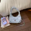 Bolsa Plissada de Luxo para Mulheres Nova Coleção Primavera e Verão 2026 Bolsa de Ombro para o Dia a Dia de Nicho Bolsa Transversal com Corrente da Moda