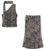 Moda europea y americana transfronteriza para mujer AliExpress INS artículo más vendido top halter de punto acanalado con hilo metálico + conjunto de falda midi