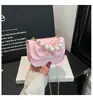 Bolsa Feminina Quadrada Pequena Tendência e Fashion de Luxo Leve Novo Estilo 2026 Corrente de Pérolas Laço de Pérolas Ombro Único Transversal