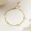 Tobillera de Acero de Titanio y Oro de 18 Quilates para Mujer, Cadena para el Pie de Nuevo Estilo Otoño/Primavera Transfronterizo, Lujo Ligero Nicho, Alta Gama para Chicas, No se Desvanece, Venta al por Mayor