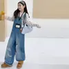 Jeans para niñas 2026 nueva colección de otoño, overol casual de mezclilla rasgada con pierna ancha, pantalones de moda para niñas mayores