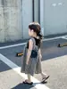 Ropa para niños 2024 Verano estilo coreano para niñas pantalones casuales de tirantes a cuadros mono de pierna ancha pantalones de tirantes cortos holgados