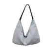 Bolso de axila de moda estilo coreano transfronterizo para mujer, bolso de hombro casual a rayas, bolso de mano de gran capacidad simple y artístico estilo bosque