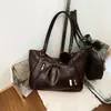 Bolso de mano vintage plisado para mujer, nueva versión coreana 2026, bolso de hombro de gran capacidad, bolso de mano versátil de nicho para el día a día, moderno