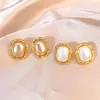 Set de Aretes de Perla con Borde Dorado Ovalados, Estilo Otoño e Invierno, Pendientes Elegantes de Gama Alta Retro de Hong Kong al por Mayor