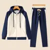 Nuevo traje informal Marca de moda Moda Primavera y Otoño Deportivo para mujer Sudadera con capucha Color sólido Traje de pantalones versátil