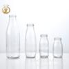 Lugar de fábrica mini botella de leche de vidrio 100ml pudín de seda con logo personalizable grande favorablemente