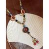 Collar de cerámica retro estilo bohemio para mujer, nuevo estilo chino, estilo extraterrestre, accesorios de cadena larga de lana de alta gama