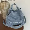 Bolsa de mano de mezclilla lavada transfronteriza para mujer, nuevo modelo 2026, bolso de gran capacidad, versátil para la escuela y el trabajo