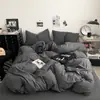 Juego de cuatro piezas de funda de edredón y sábana de cama lavables de color liso, diseño simple para dormitorios de estudiantes, apto para todas las estaciones, se puede usar para dormir directamente en la cama, juego de tres piezas