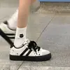 Zapatillas de moda estilo coreano, dulce y genial diseño de estrella, nueva colección otoño 2026, suela gruesa, versátiles, perfectas para la escuela y estudiantes, zapatillas de lona de nicho para mujer