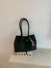 Bolso grande tejido de patrón casual de comercio exterior para mujer, bolso tote de moda súper popular, bolso de hombro retro de gran capacidad para el día a día