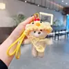 Nuevo Sombrero de Punto de Dibujos Animados Bolso Cruzado Oso de Peluche Llavero de Coche Muñeca Linda y Adorable Colgante Decorativo para Bolso