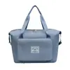 Bolsa deportiva portátil de gran capacidad transfronteriza para fitness, bolsa de viaje diagonal de corta distancia para mujer, bolsa de hombro repelente al agua para yoga, venta al por mayor