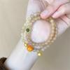 [Taihu Lake] Nueva pulsera de estilo antiguo de loto chino para mujer, nicho ligero, pulsera avanzada de lujo, nueva pulsera con borlas 2023