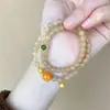 Nuevo Estilo Chino "Lo Que Quieres" Pulsera de Loto Apilada de Doble Capa con Cuentas Sentido del Diseño Pulsera de Lujo Ligero Nicho Regalo